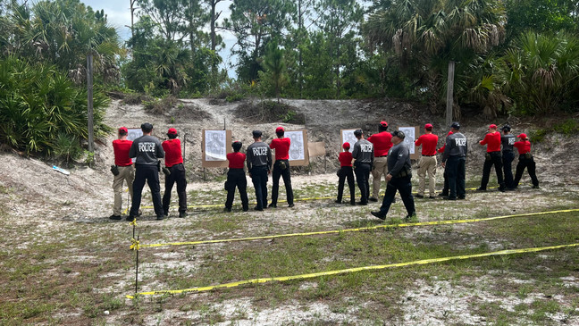 Law enforcement explorers receiving weapons training. (WPEC)