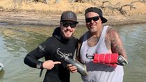 Image for story: Underwater treasure hunter recovers prosthetic arm for man at California lake