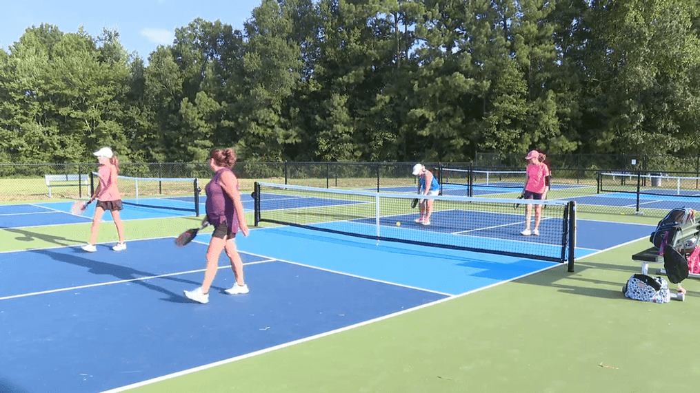 People play pickleball on some newly constructed pickleball courts at Creekside Park in New Bern. (Photo: Bilyana Garland, NewsChannel 12)
